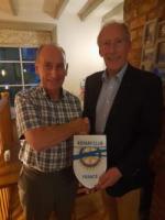 Seen here is James Vallender  (right) of the Rotary Club of Nantes Sur Loire. France presenting Kinver President Alan Millichip with a banner to commemorate his visit